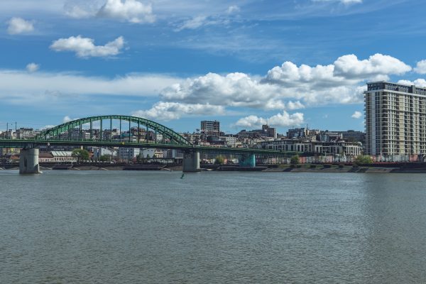 A breathtaking view of the Old Sava Bridge spanning over the river in vibrant Belgrade, Serbia. Architecture 4K