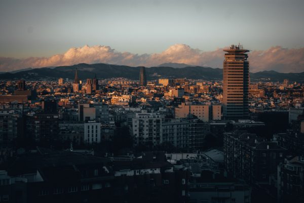A captivating view of Barcelona's skyline during sunset, featuring iconic architecture. Architecture 4K