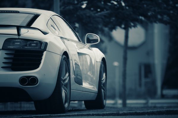 A luxury white sports car parked on a street in Jönköping, Sweden. Voitures 4K