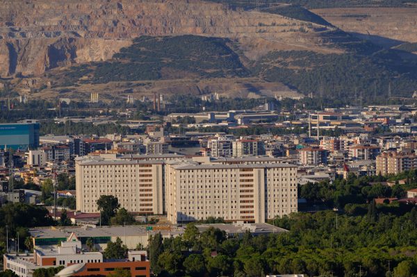A sprawling urban view of İzmir, Türkiye, highlighting modern architecture and mountainous backdrop. Nature 4K
