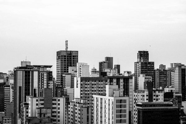 A striking black and white cityscape capturing the urban skyline's architectural diversity. Architecture 4K