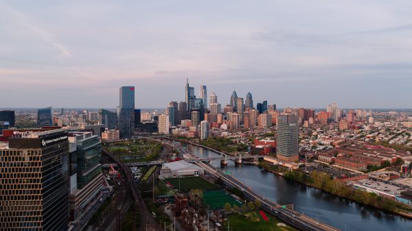 A stunning aerial view of the Philadelphia skyline with clear skies, capturing the cityscape and urban development. Architecture 4K