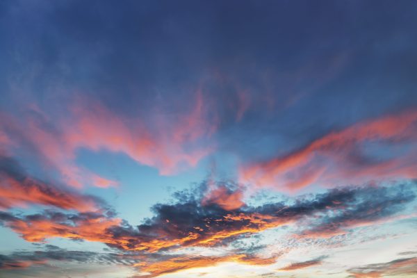 A stunning twilight sky filled with vibrant hues and dramatic clouds, showcasing nature's beauty. Nature 4K