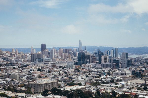 A stunning view of San Francisco's skyline showcasing famous landmarks under a clear blue sky. Architecture 4K