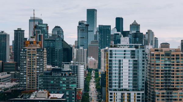 Aerial view of Seattle's downtown skyline showcasing modern skyscrapers and urban architecture. Architecture 4K