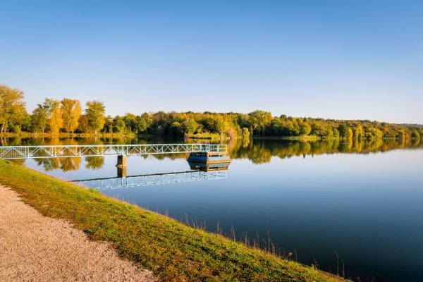 Beautiful autumn landscape with lake reflections near Pécs, Hungary. Nature 4K