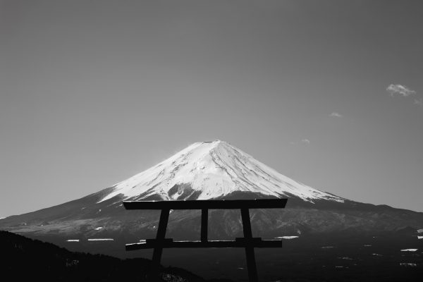 Black and white image of Mount Fuji with a Torii gate silhouette in Fujikawaguchiko, Japan. Anime 4K