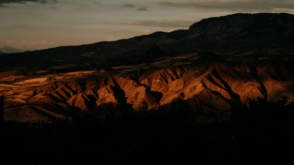 Breathtaking aerial view of eroded hills during sunset in Şebinkarahisar, Türkiye. Nature 4K