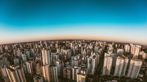 Breathtaking aerial view of Goiânia's skyline showcasing tall buildings and cityscape under a clear sky. Architecture 4K
