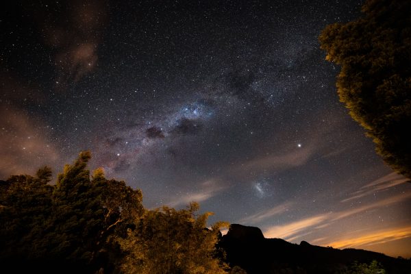 Breathtaking starry night sky view with Milky Way and scenic landscape in São Bento do Sapucaí. Espace 4K
