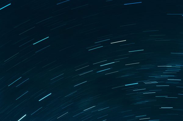 Captivating image of star trails in a clear night sky, showcasing the beauty of astronomy. Espace 4K