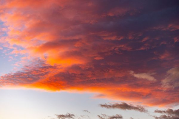 Captivating sky with vibrant orange and purple hues at sunset. Nature 4K