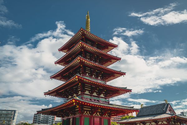 Capture the beauty of the iconic Shitennoji Temple pagoda set against a vibrant blue sky in Osaka, Japan. Anime 4K