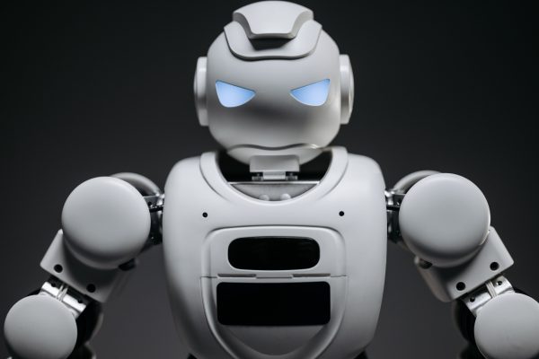 Detailed studio shot of a modern robotic toy with a dark background, showcasing technological design. Geek 4K