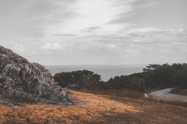 Dramatic coastal view with rocky hill and sea in Mölle, Skåne län, Sweden. Nature 4K