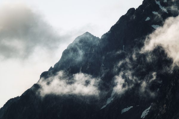 Dramatic view of misty mountain peaks in Sochi, capturing nature's serene beauty. Nature 4K