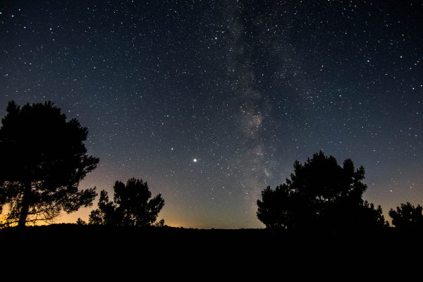 Explore the captivating cosmos and Milky Way under a starry night in France's picturesque countryside. Espace 4K