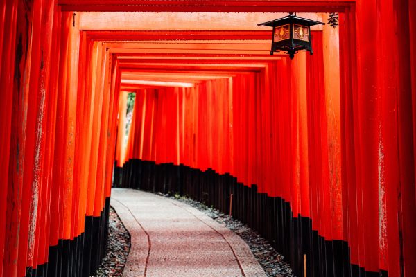 Explore the iconic red torii gates of Fushimi Inari Shrine in Kyoto, Japan, featuring traditional architecture. Anime 4K