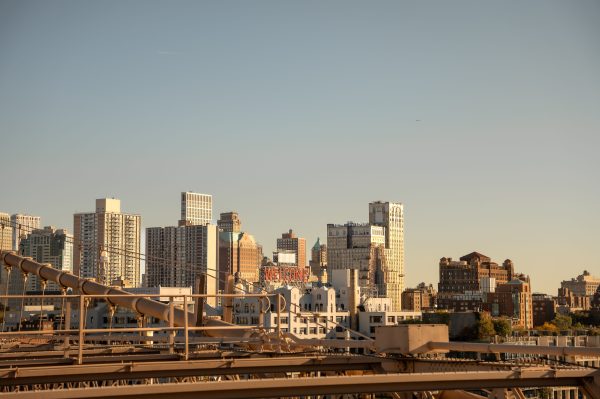 Explore the iconic skyline of New York City captured from Brooklyn Bridge, showcasing urban architecture and vibrant city life. Architecture 4K