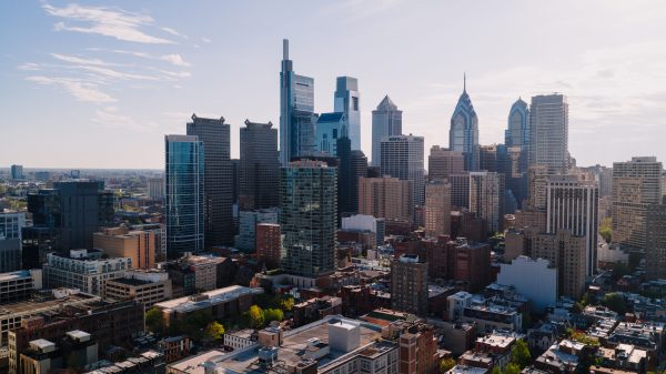 High angle view of Philadelphia's modern skyline with clear blue skies. Architecture 4K