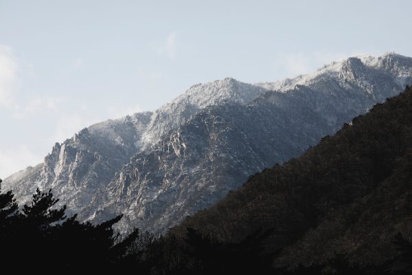 Majestic view of snow-dusted peaks in Seoraksan National Park on a clear winter day. Nature 4K