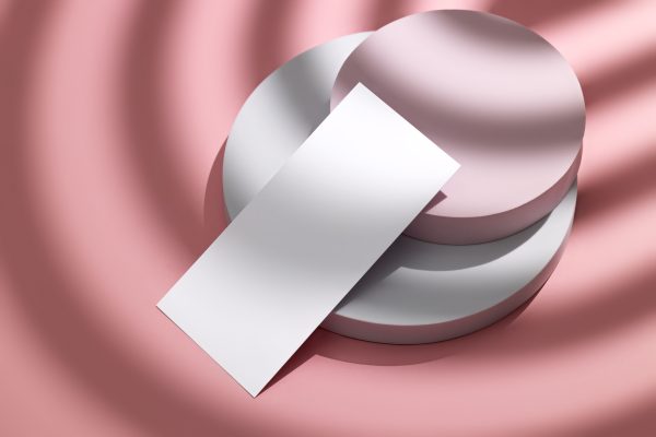 Minimalist composition featuring round blocks and a paper card on a pink background. Minimaliste 4K