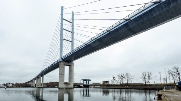 Rügen Bridge spanning the waters of Stralsund, Germany on a cloudy day, showcasing modern architecture. Architecture 4K