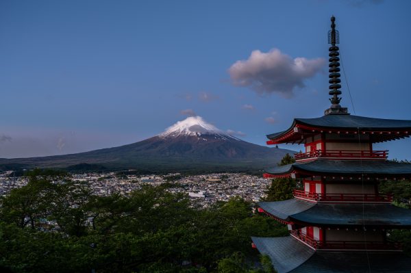 Scenic view of Mount Fuji with Chureito Pagoda, capturing Japan's iconic landscape during twilight. Anime 4K
