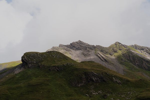 Scenic view of rugged Alp summit in Grindelwald, Switzerland under overcast sky. Nature 4K