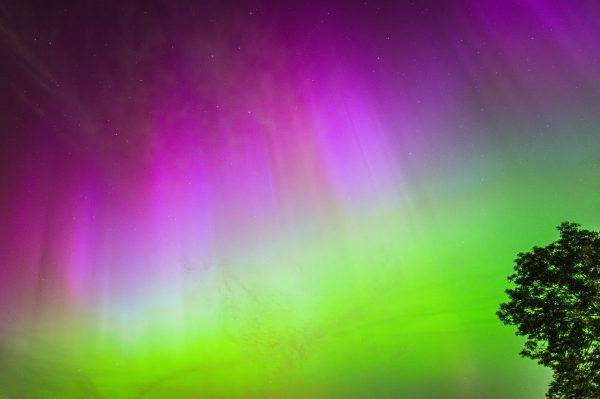 Spectacular display of northern lights in vibrant colors over Roermond, Netherlands. Espace 4K