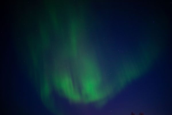 Stunning Aurora Borealis illuminating the night sky in Karasjok, Norway. Espace 4K