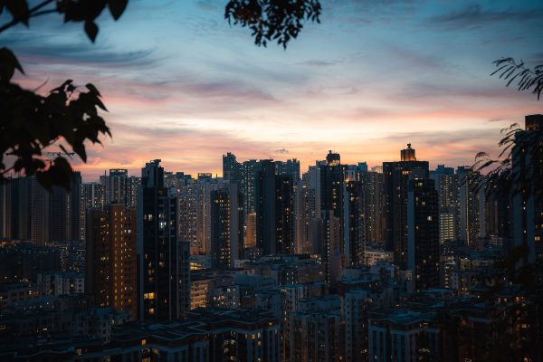 Stunning view of Hong Kong's skyline at dusk, highlighting skyscrapers against a vibrant sunset. Architecture 4K