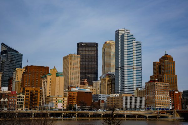 Stunning view of Pittsburgh's skyline featuring the iconic UPMC building under a clear sky. Architecture 4K