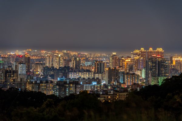 Stunning view of Taipei's skyline at night, showcasing illuminated skyscrapers and vibrant city lights. Architecture 4K