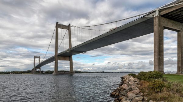 Stunning view of the New Little Belt Bridge spanning the water in Middelfart, Denmark. Architecture 4K