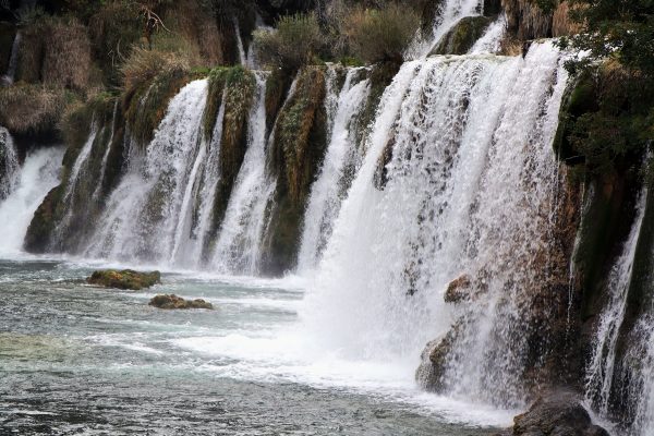 Stunning waterfalls cascading amidst lush greenery at Krka National Park in Croatia. Nature 4K
