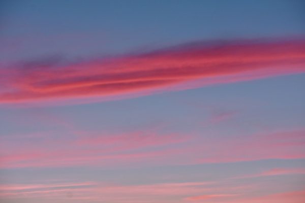 Tranquil pink and blue hues blend beautifully in a serene sunset sky. Nature 4K