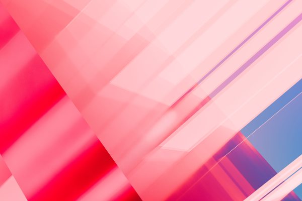 Vibrant abstract geometric pattern with pink and blue gradients creating a modern artistic background. Abstrait 4K