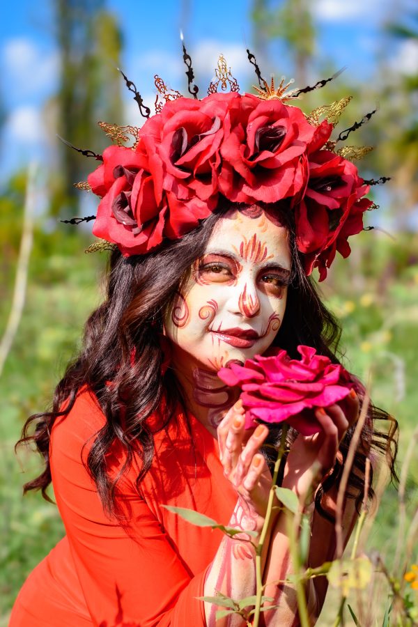 Vibrant portrait of a woman with floral crown, Day of the Dead makeup. Mobile 4K