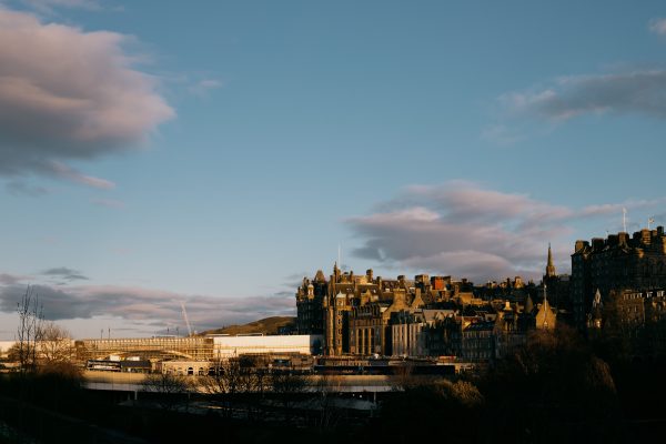 View of Edinburgh's historic architecture against a stunning sunset sky. Architecture 4K